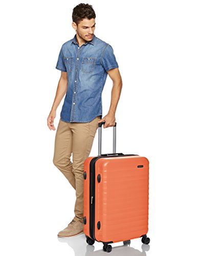 AmazonBasics - Maleta de viaje rígidaa giratoria - 68 cm, Naranja fuerte