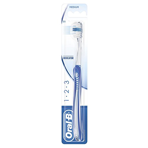 Oral-B 123 Indicator Cepillo de dientes manual mediano, suave en los dientes y las encías, cerdas medianas, colores surtidos