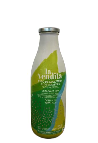 La Vendita Jugo De Aloe Vera Puro Para Beber Con Pulpa. Bebida Natural De Aloe Vera Puro Y Ecológico. Zumo Bebible 100% Organico Y Natural. Bebida Detox En Envase De Vidrio De 1 Litro