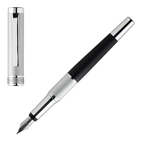 Hugo Boss: Pluma estilográfica Dual Cromo-Black. Bolígrafo con superficie grabada metálica, con inserción moderna de aluminio cepillado y anillo mate con garra Hugo Boss.