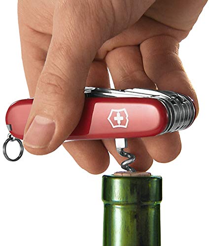 Victorinox Swiss Champ Navaja con 33 funciones, incluyendo alicates combinados, tijeras y lupa, de color rojo transparente