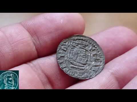 El fascinante reverso de una moneda con un escudo emblemático